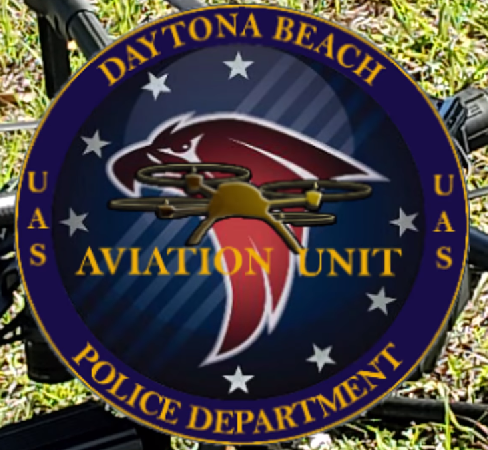 UAS unit logo with drone in background